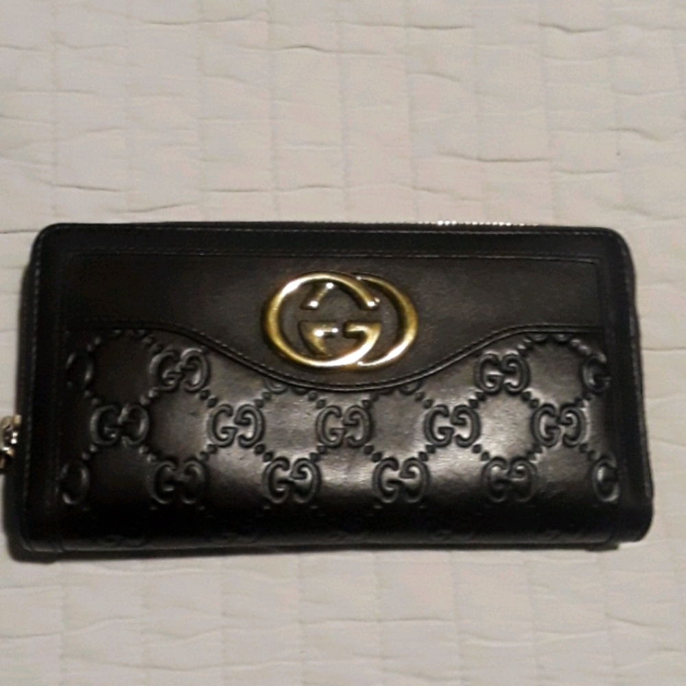 Sold-Guccissima zip around wallet